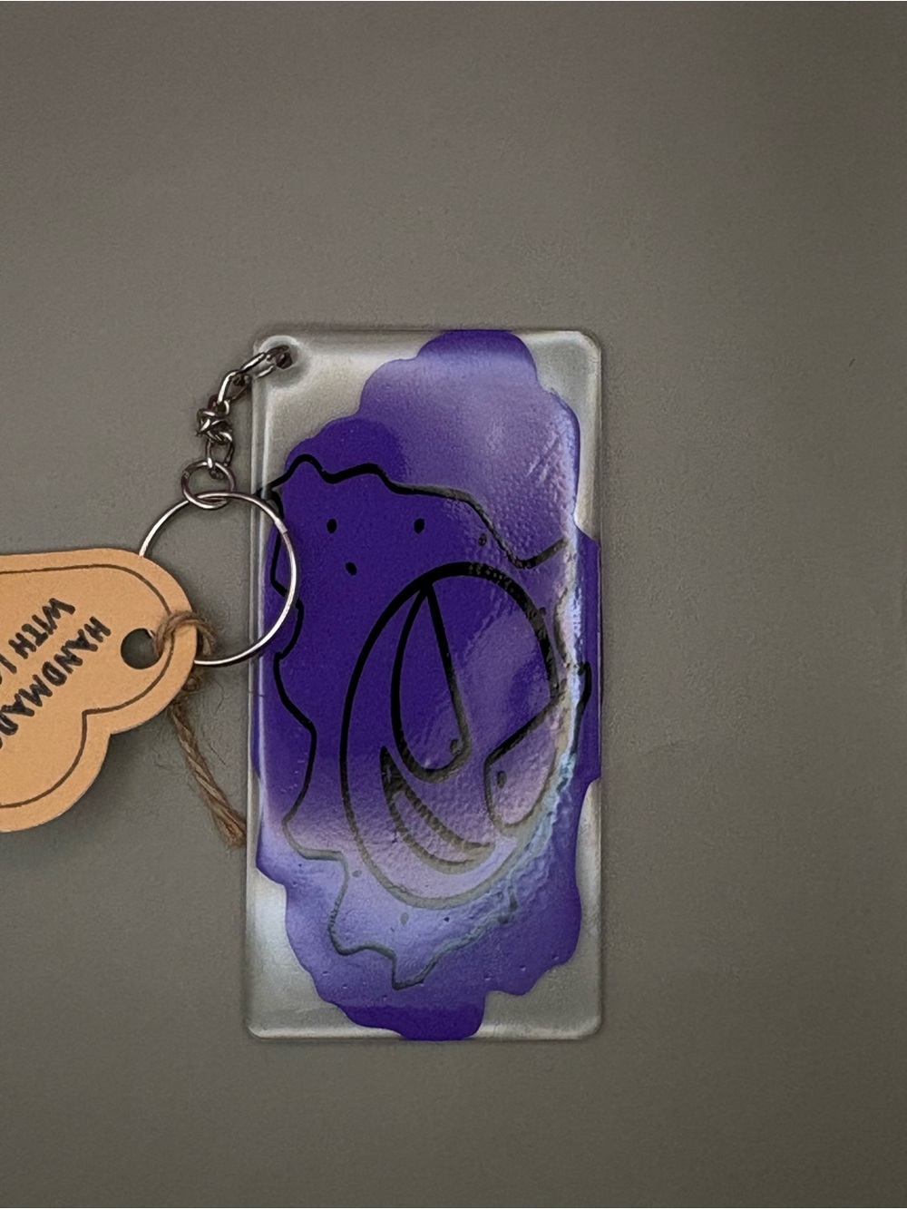 Ghastly Resin Dangle Keychain with Black Line Art